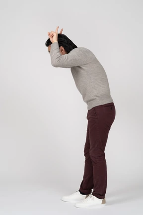 Man in casual clothes posing