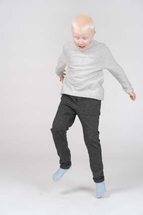 Front view of a boy jumping