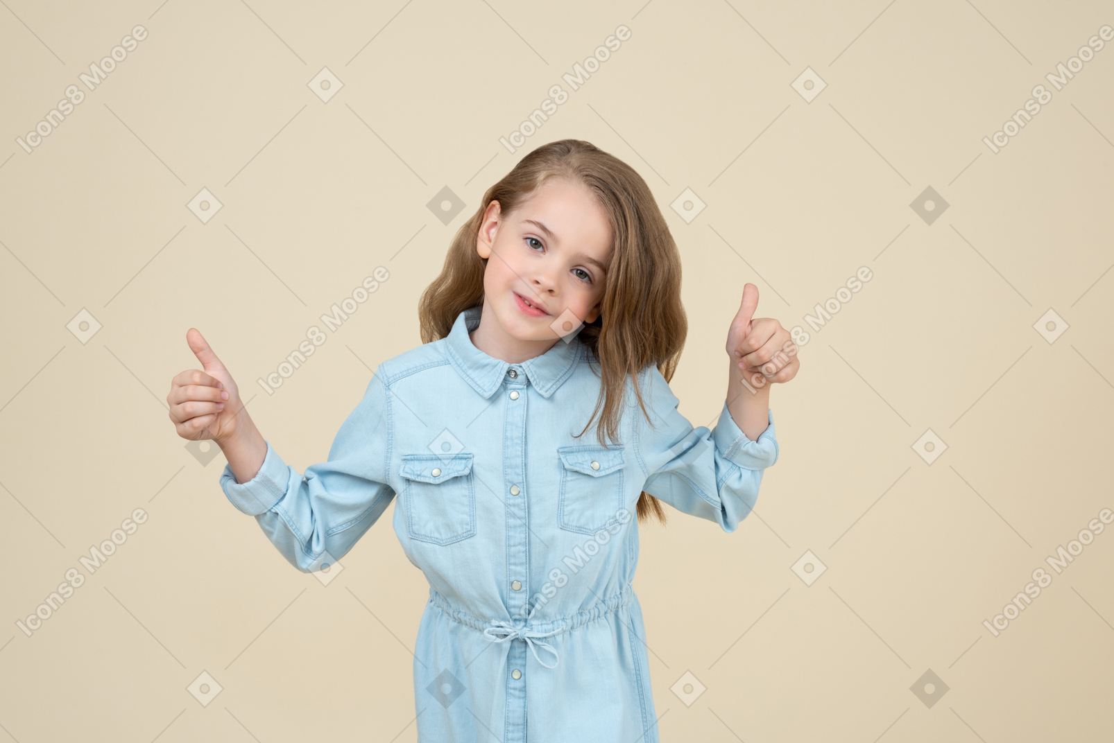Cute little girl showing thumbs up