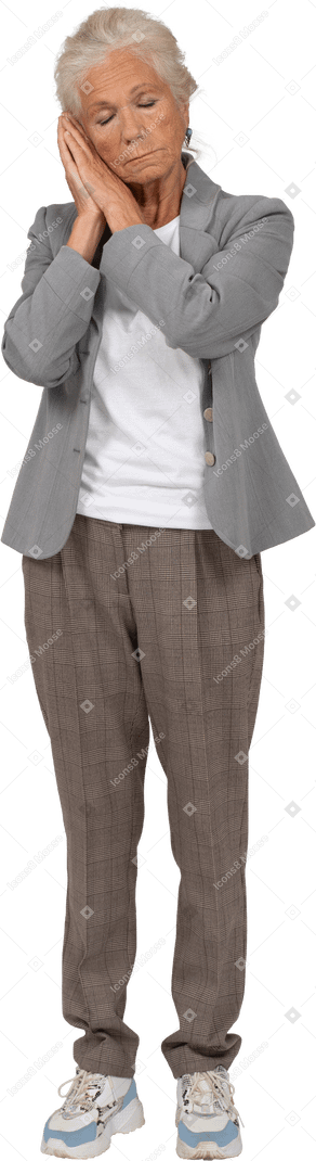 Front view of a sleepy old lady in suit
