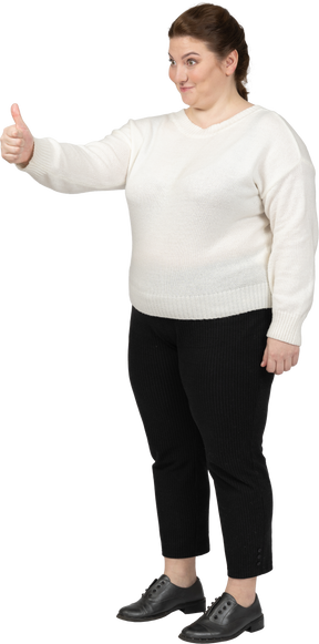Plus size woman in casual clothes showing thumb up