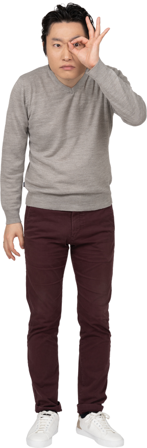 Man in casual clothes posing