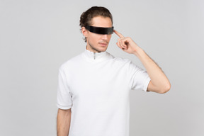 Young man in a futuristic eyewear making big data analysis