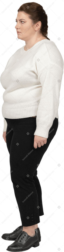 Serious plump woman in casual clothes
