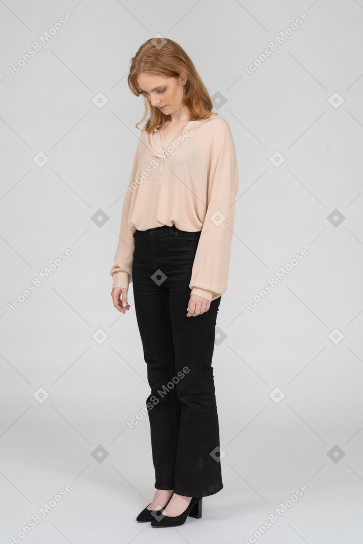 Woman in beautiful blouse standing