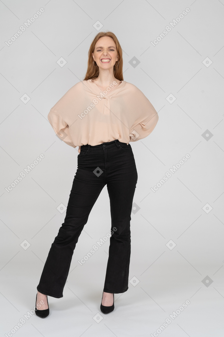 Woman in beautiful blouse standing