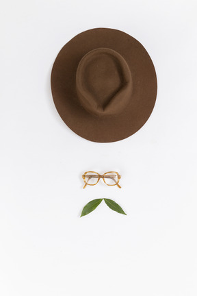 Face made out of hat and glasses