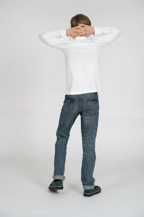 Young man in casual clothes standing