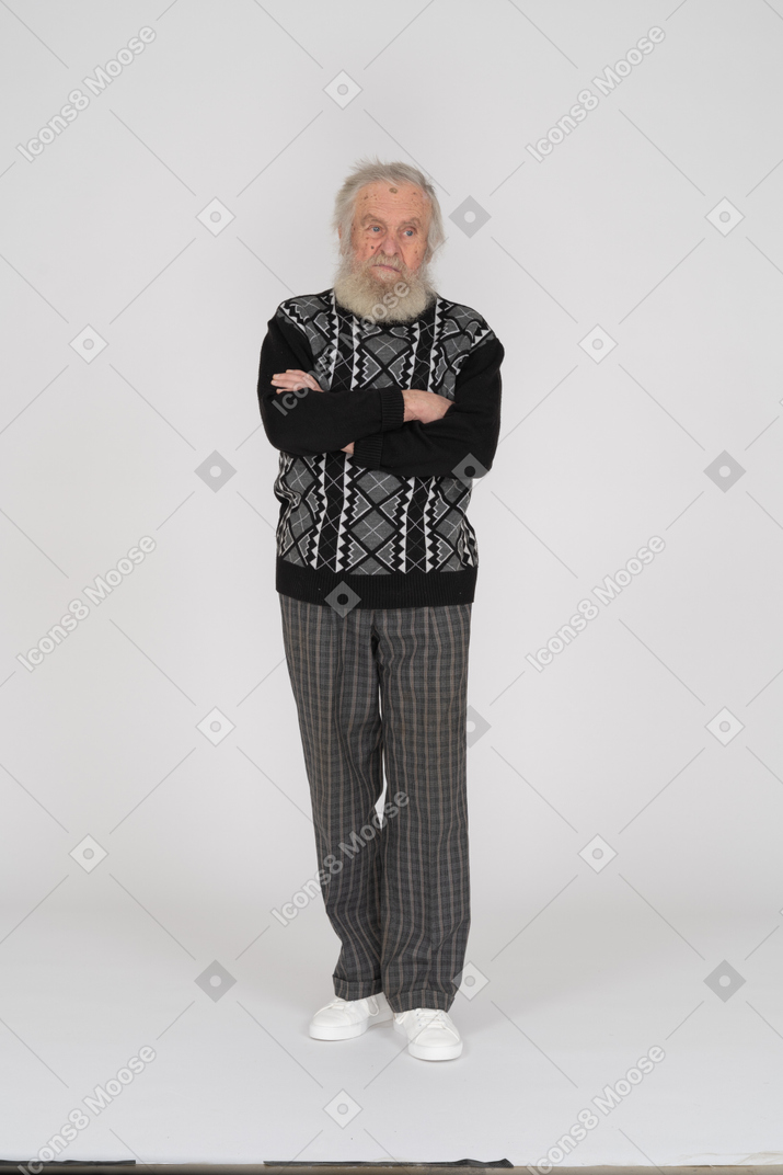 Old man with folded arms