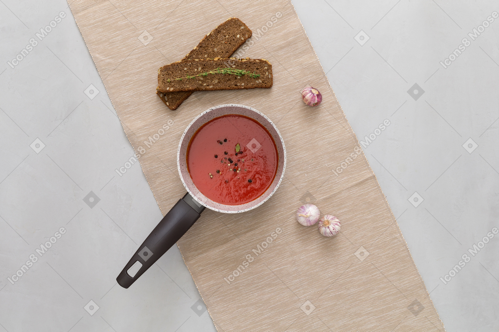 Tomato sauce in pan, snacks and garlic