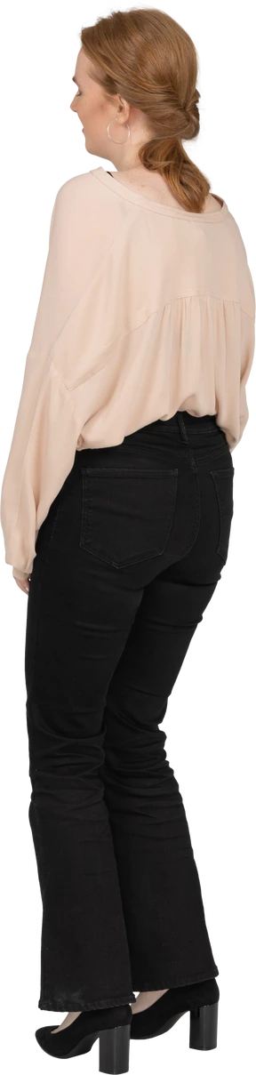 Woman in beautiful blouse standing