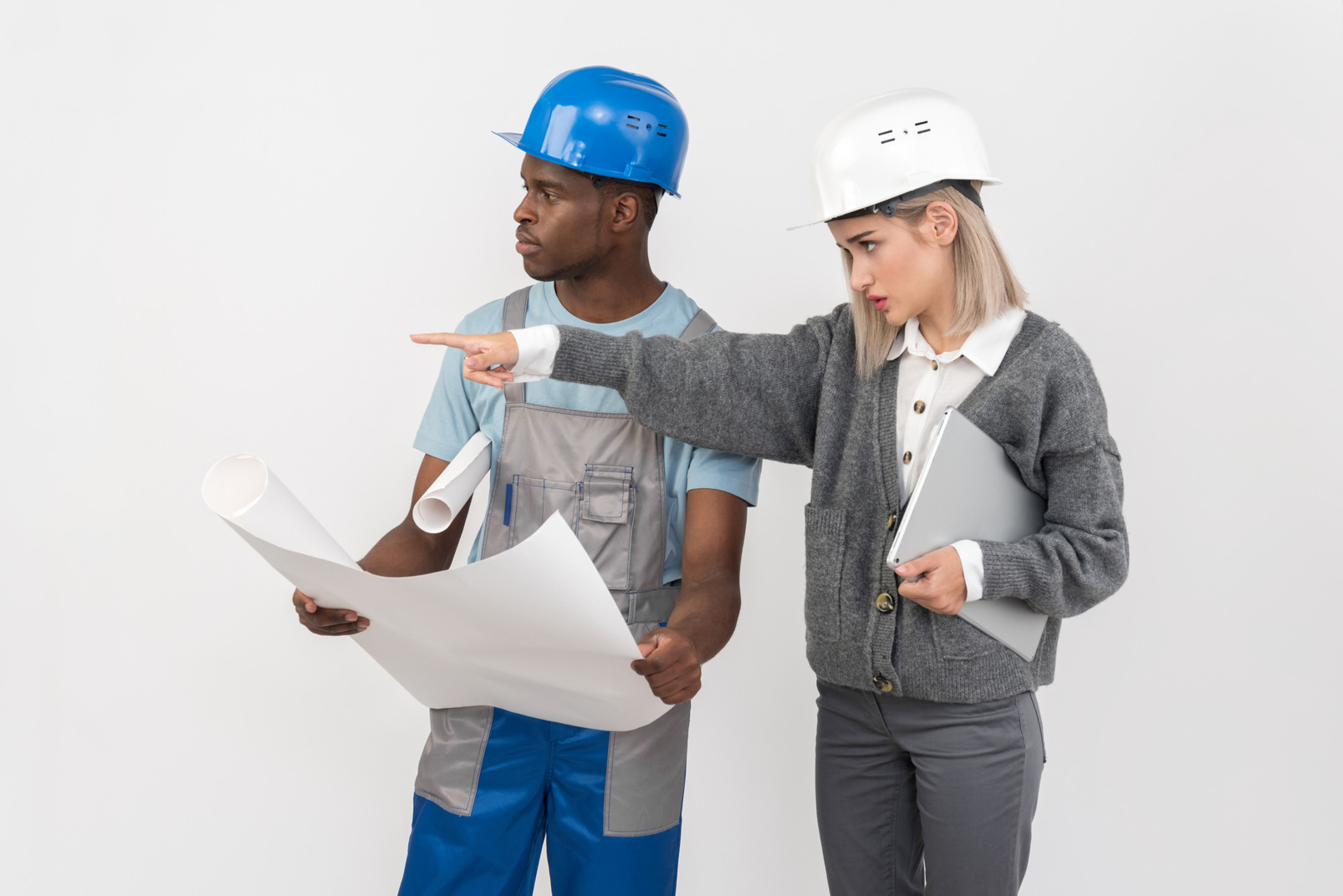 Female engineer giving instructions to male foreman