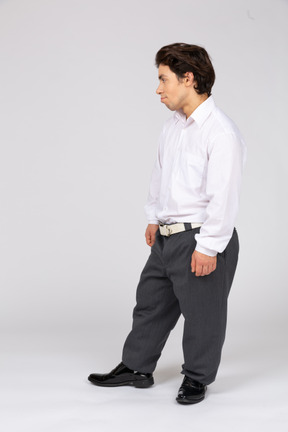 Profile view of young man in office clothes