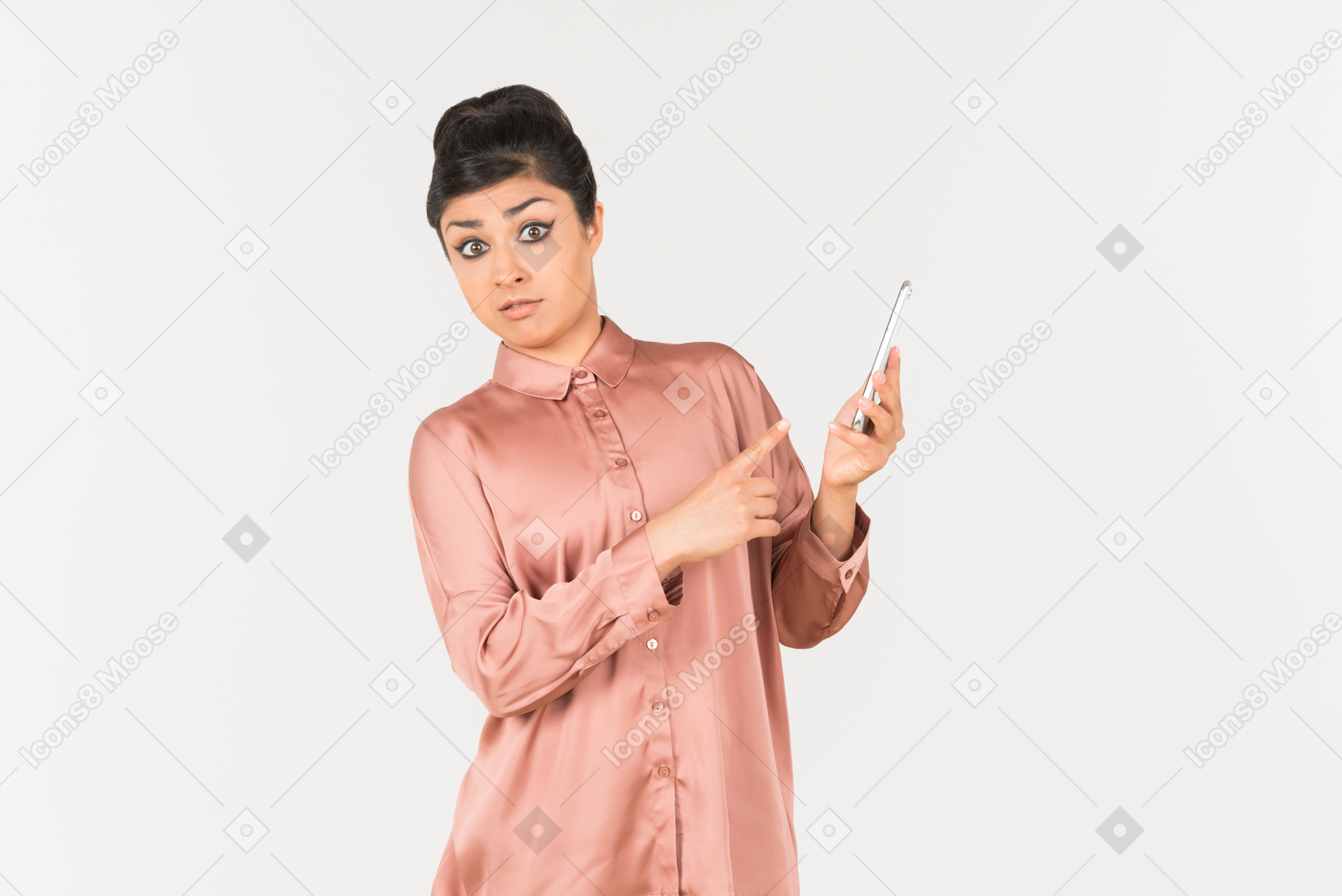 Surprised indian office worker holding phone