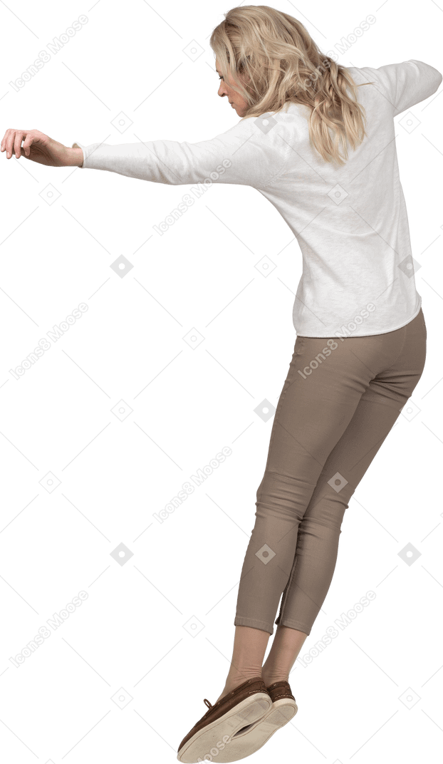Woman in casual clothes jumping