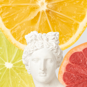 Marble head statue on citrus background