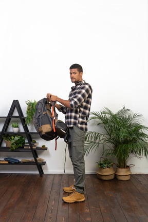 Good looking young man with a backpack