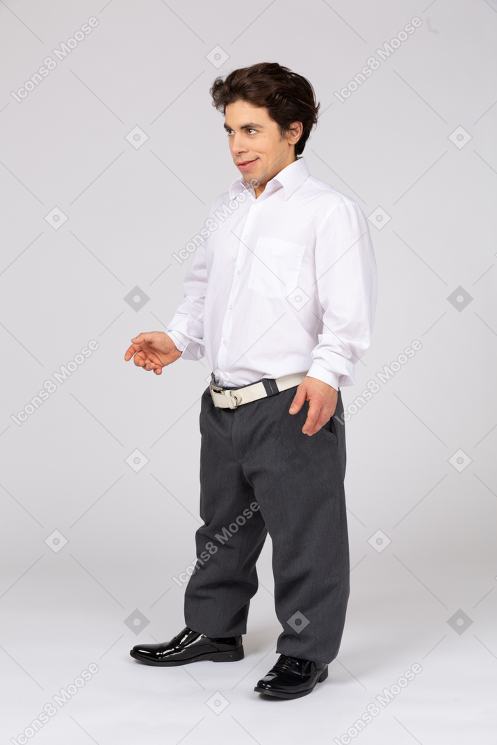 Standing young man grinning