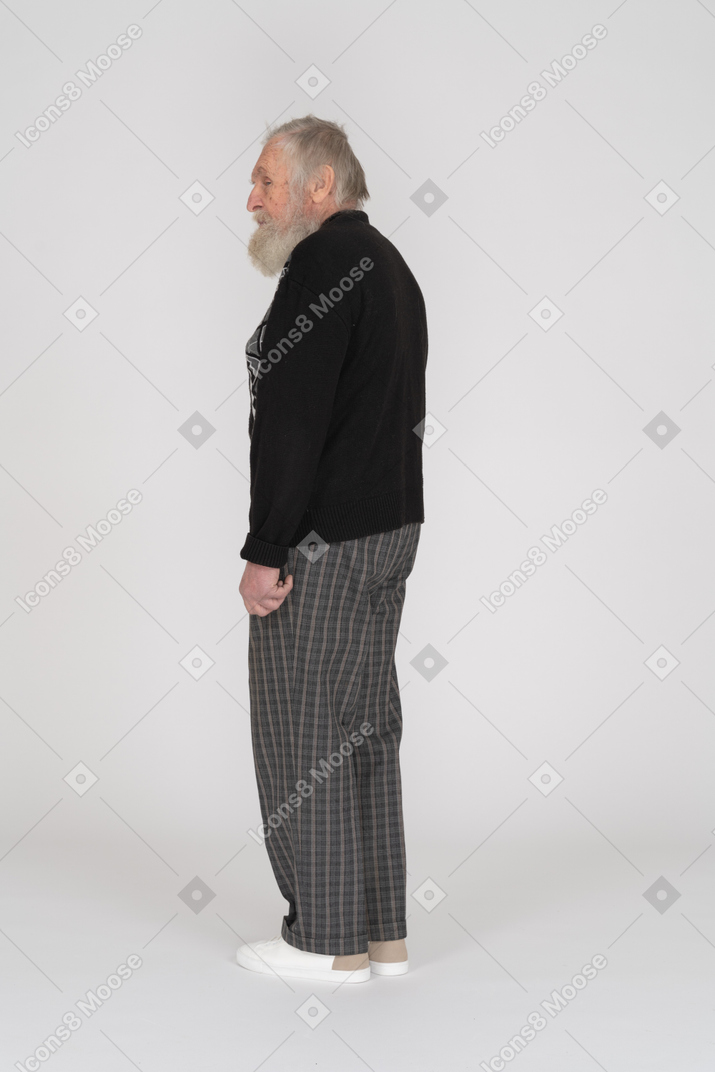 Old man standing and watching