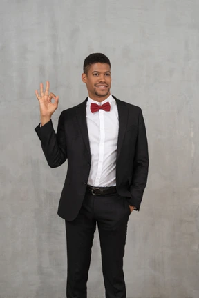Man in black suit standing