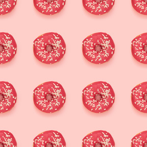 Glazed doughnuts over pink background