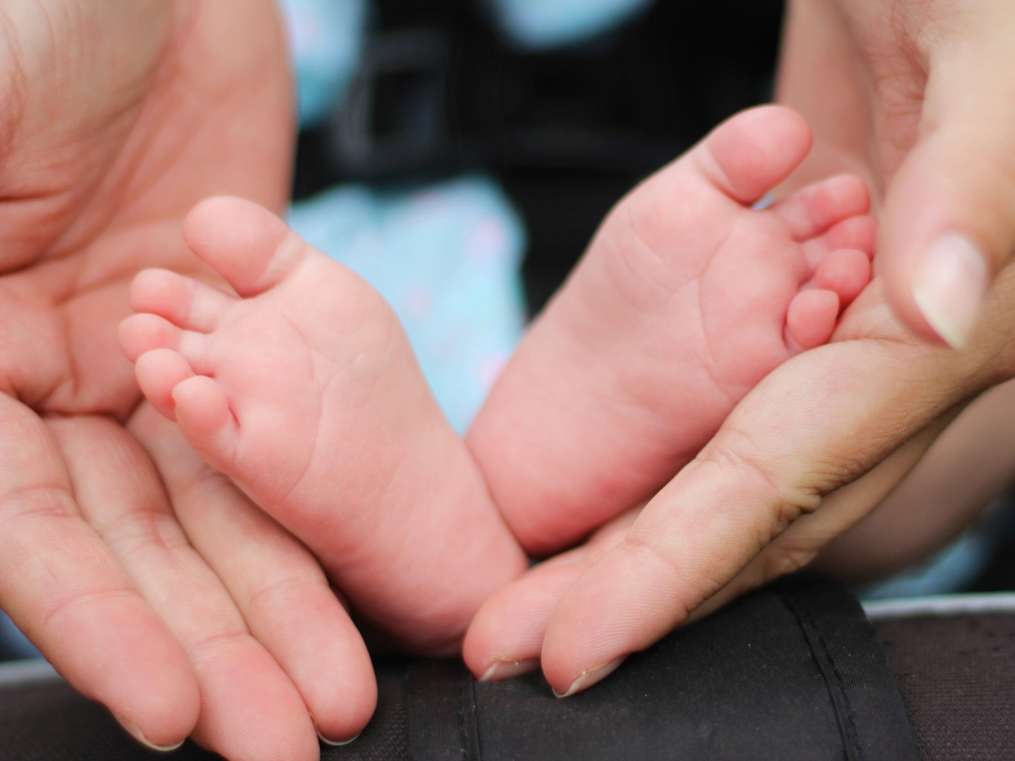 Small feet of a newborn