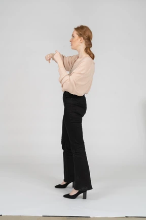 Woman in beautiful blouse standing