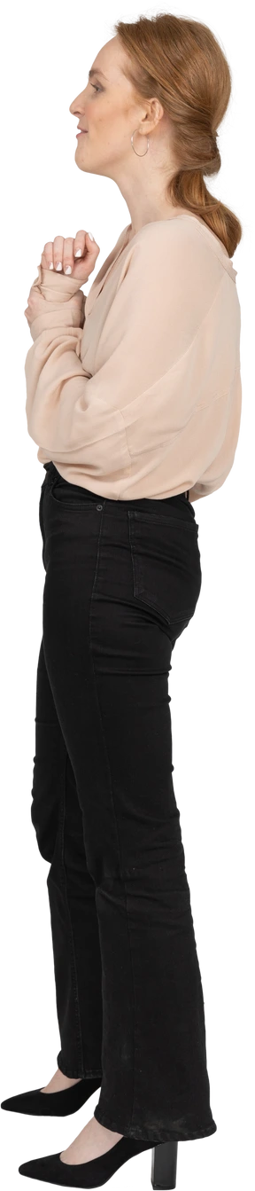 Woman in beautiful blouse standing