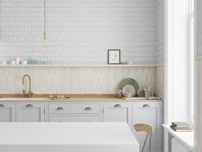 Kitchen with white brick wall and dining area