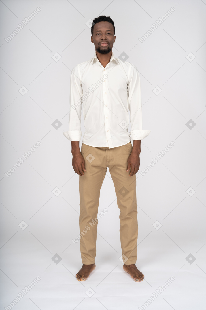 Man in white shirt standing