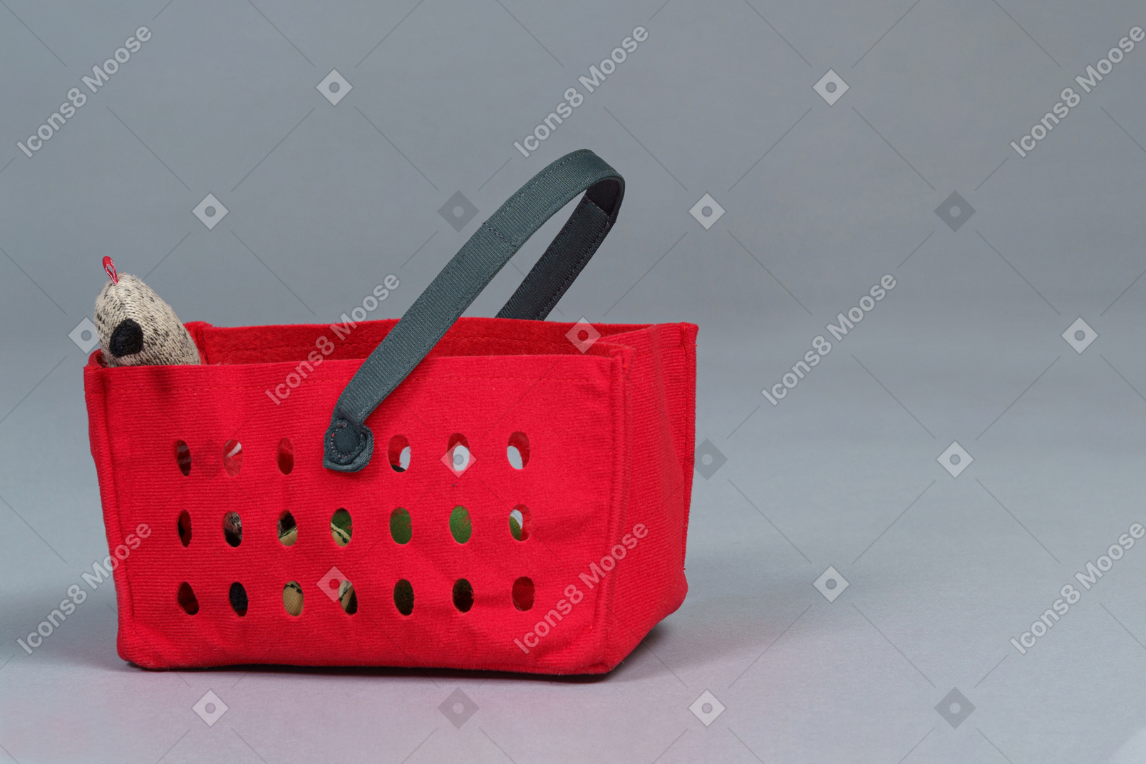 A red cart isolated on a gray background