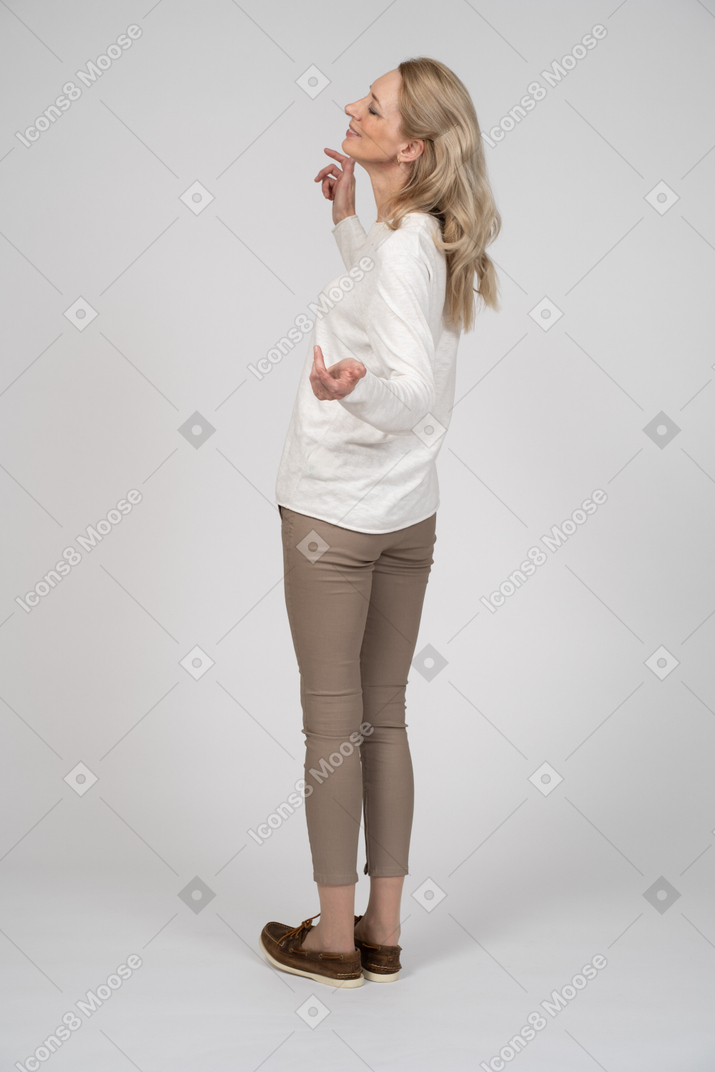 Woman in casual clothes posing