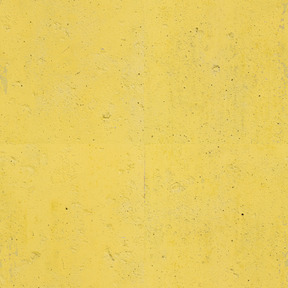 Concrete wall painted yellow