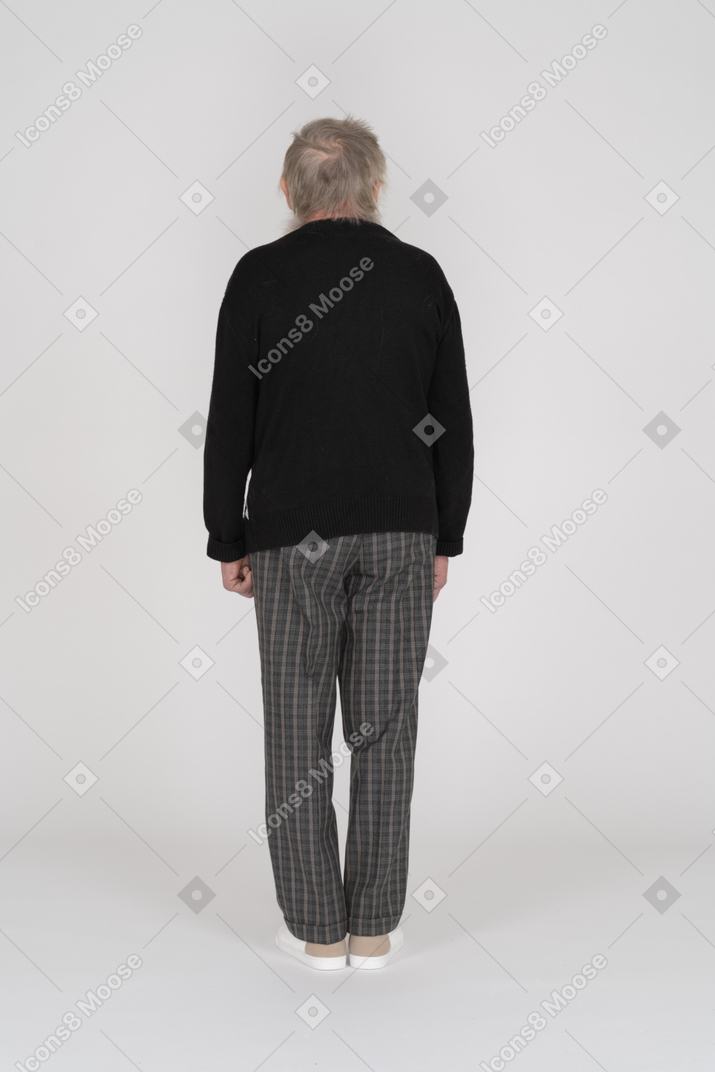 Rear view of standing old man