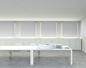 White room with desks and chairs