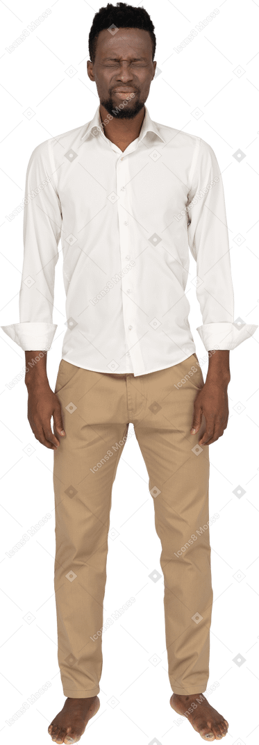 Man in white shirt standing