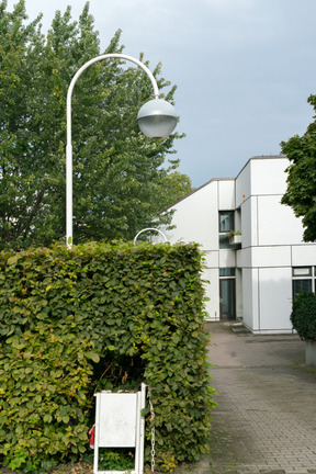 White street lamp and white building