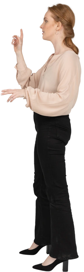 Woman in beautiful blouse standing