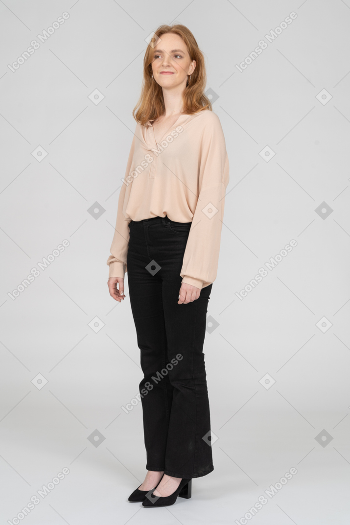 Woman in beautiful blouse standing