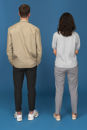 Back view of young man and woman