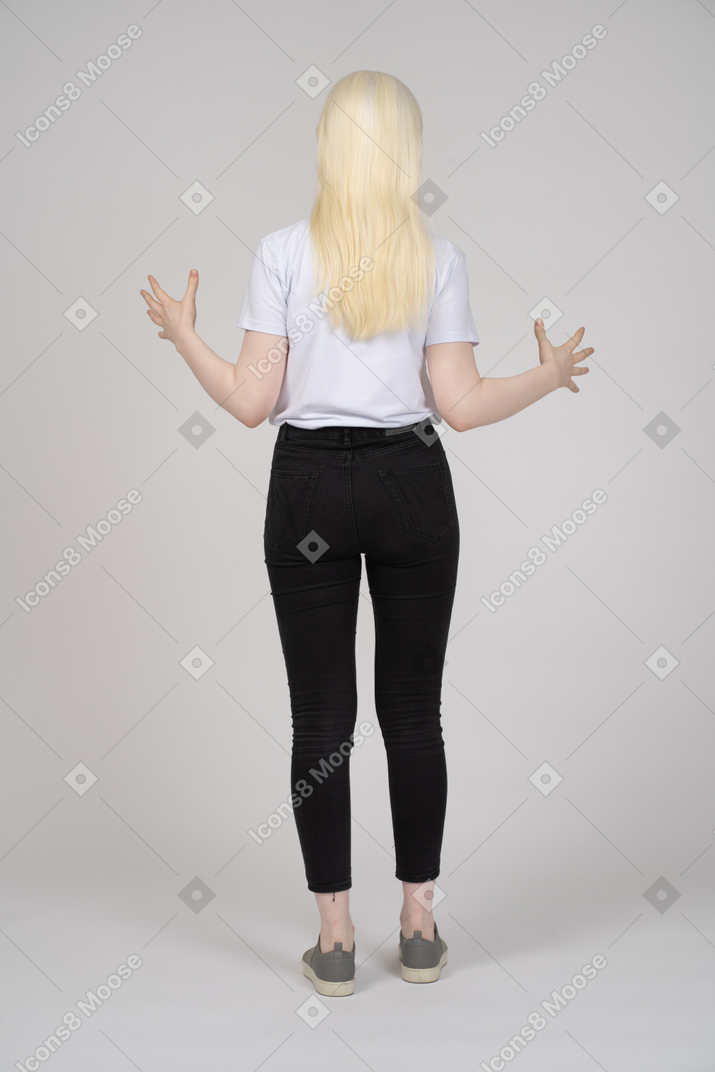 Back view of a woman gesturing