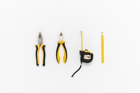 A set of working tools arranged neatly on the white background