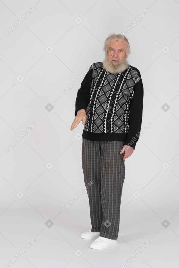 Elderly man speaking and gesturing