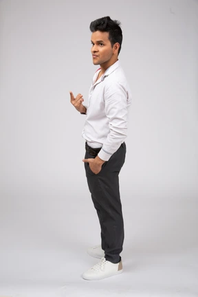 Man in white shirt standing