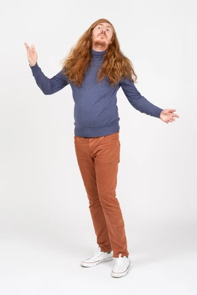 Young man in casual clothes dancing