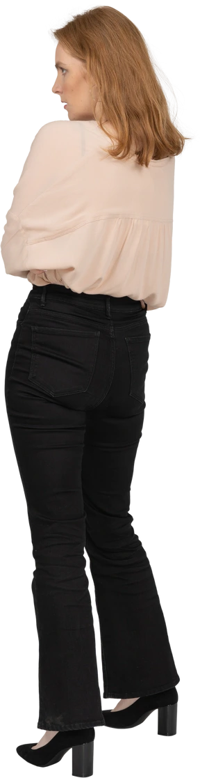 Woman in beautiful blouse standing