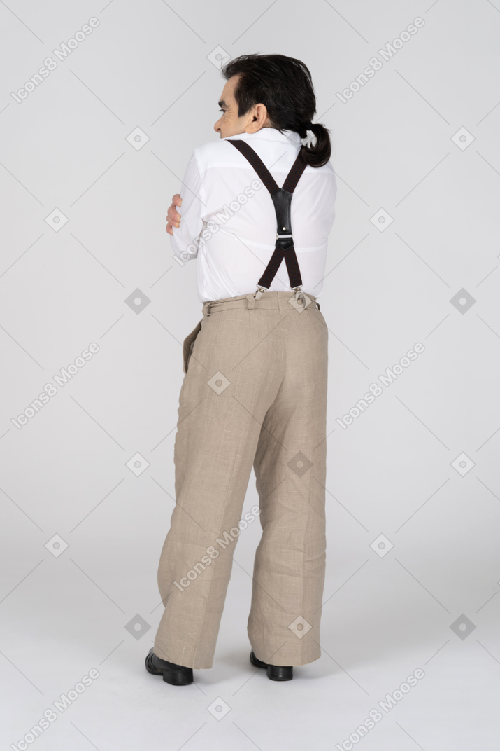 Back view of man in suspenders
