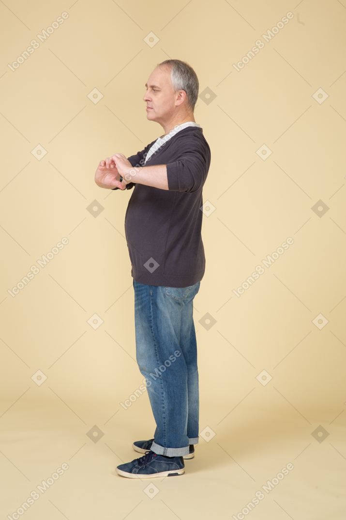 Man in casual clothes posing