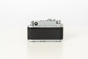 Photo camera on a white background