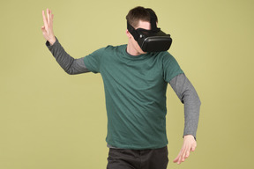 Young man exploring virtual reality